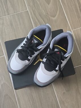 Air Jordan 4 RM Kids White, Black & Gray Low-Top Sneakers with Yellow Accents